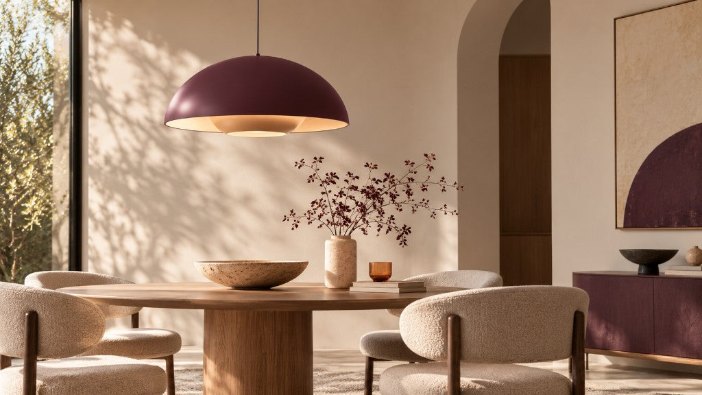 Dining room lit by a plum pendant lamp